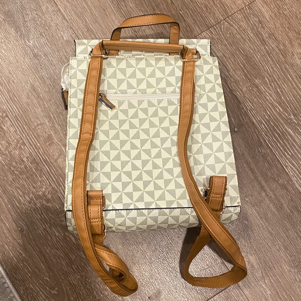 Geometric Patterned Backpack With Tan Straps - image 4